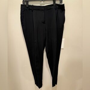 Black dress pants, loose fit very comfy
Size 6 
100% polyester